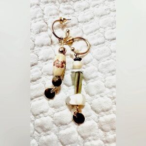 Handcrafted Asymmetrical gold-tone earrings in subdued yellow, ivory and green❣️